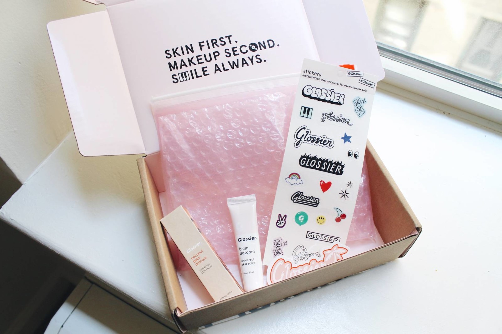 glossier box packaging